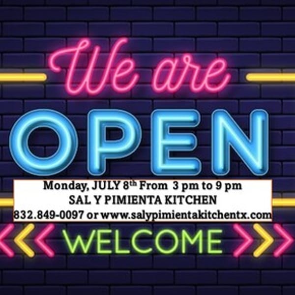 Neon sign on a brick wall reading "We are OPEN" with Sal y Pimienta Kitchen's hours and contact info.